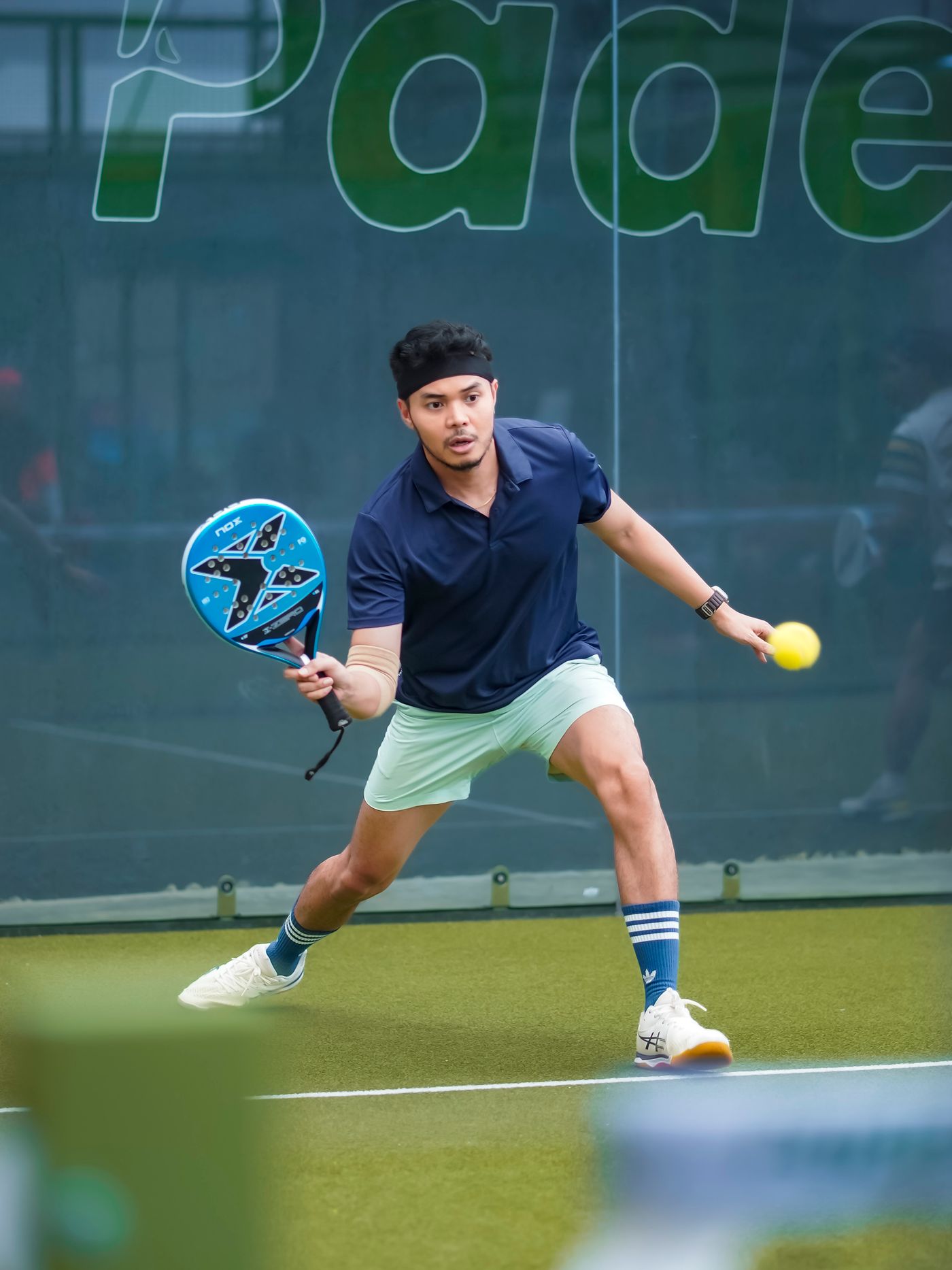 Competitive padel tournament action